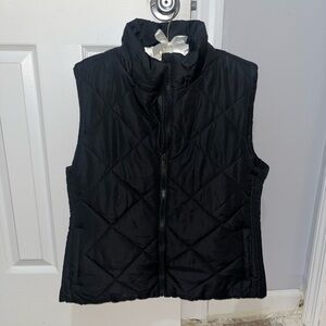 Black quilted puffy vest